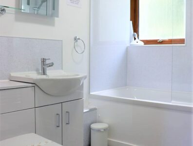 Bathroom, nice tiles, shower over bath